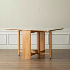 Table pliante 4-6 personnes en bois massif Agatha avec plateau en pierre sintérisée