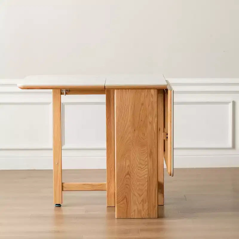 Table pliante 4-6 personnes en bois massif Agatha avec plateau en pierre sintérisée