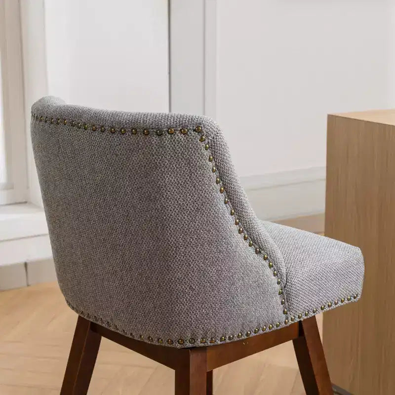 Tabourets de comptoir pivotants en bois garnis de tissu Spin 26 po
